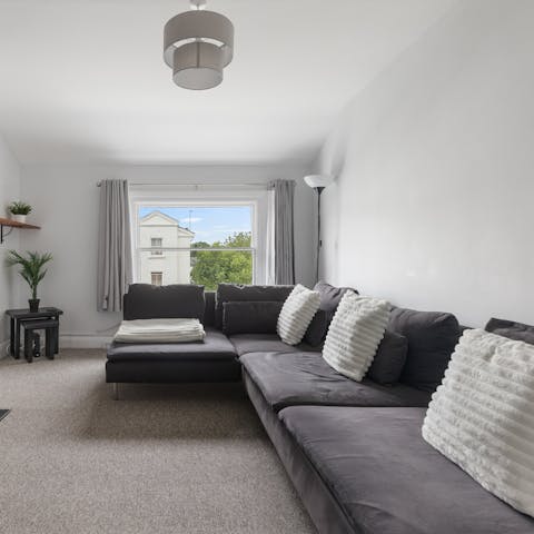 Relax, unwind and watch a movie in the living room
