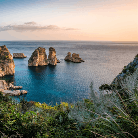 Explore Favignana, the largest of the Egadi Islands, including Cala Azzurra, 1 kilometre away