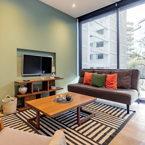 Relax in the light-filled living area, with the addition of high speed Wifi