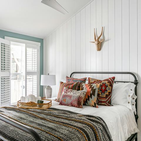 Admire the vintage-inspired design and pretty patterned fabrics throughout the home