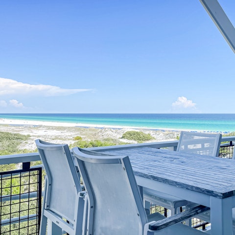 Dine alfresco on the balcony as the sun goes down