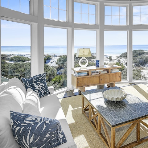 Lounge in the living area and soak up the coastal views