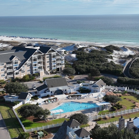 Stay on a resort with a shared pool and direct beach access