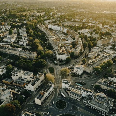 Head half an hour west to sightsee and shop in Cheltenham