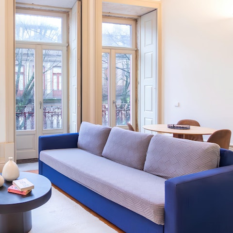 Relax on the cosy sofa after a day exploring the city