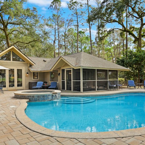 Lounge by the private pool and saltwater hot tub