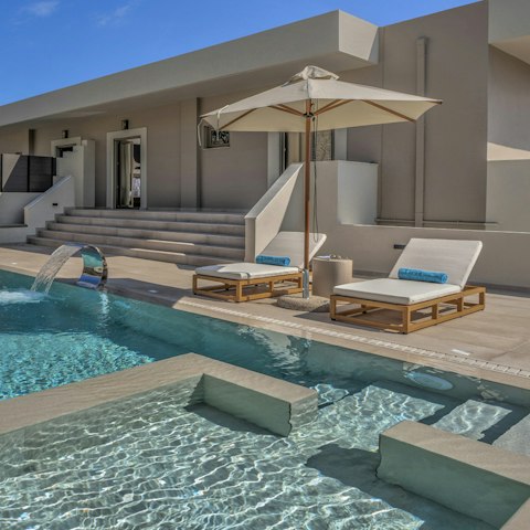 Enjoy peace and tranquility, lounging by the pool
