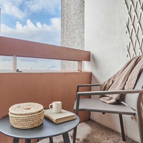 Enjoy your morning coffee on the small balcony
