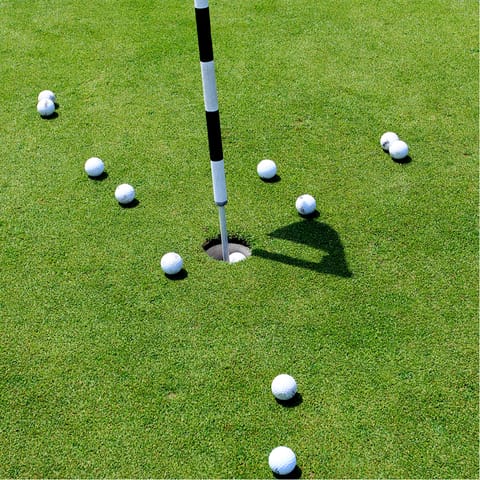 Take a short stroll to practise your swing on the nearby course