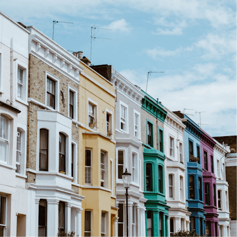 Explore antique shop-lined Portobello Road, a five-minute walk away