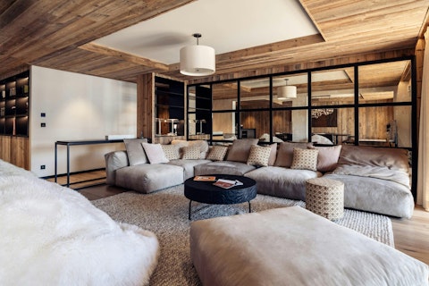 Gather the whole group in this generous alpine living space
