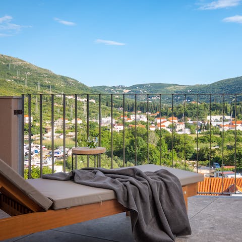 Enjoy a quiet moment with yourself and a good book on the balcony