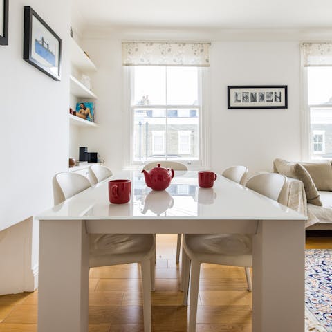 Gather round the contemporary dining table for relaxed dinners
