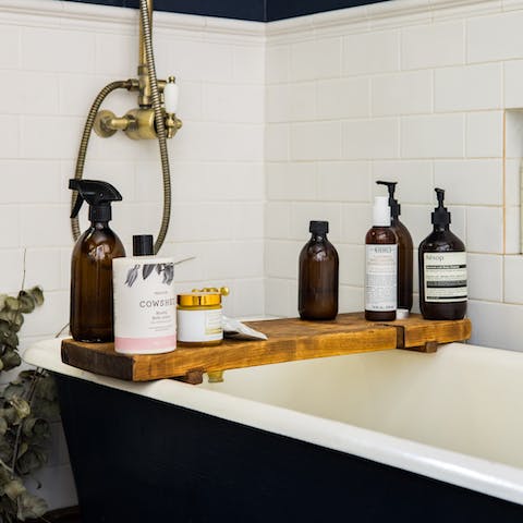 Treat yourself to a long soak in the lovely roll-top bath