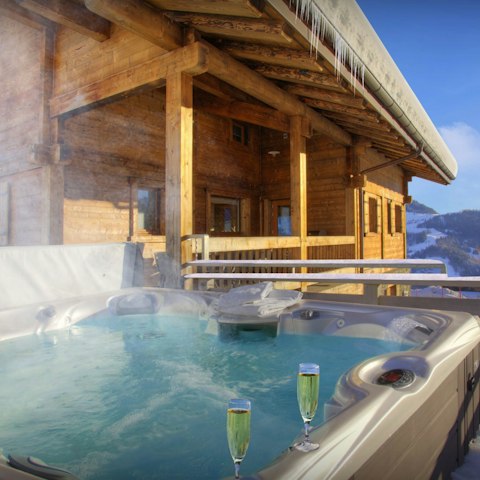 Relax in the Jacuzzi with a glass of Champagne