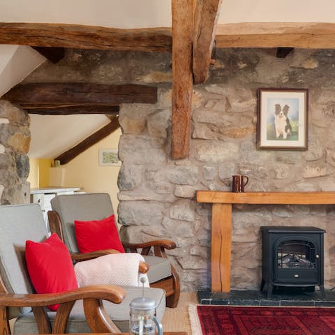 Recline in the plump armchairs and toast your feet by the fire