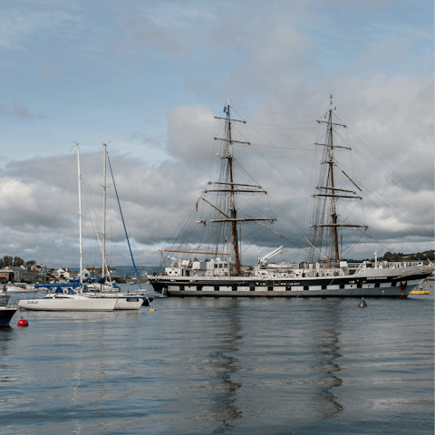 Watch the boats bob on the River Teign, a six-minute drive away