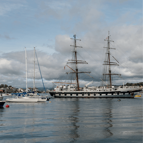Watch the boats bob on the River Teign, a six-minute drive away
