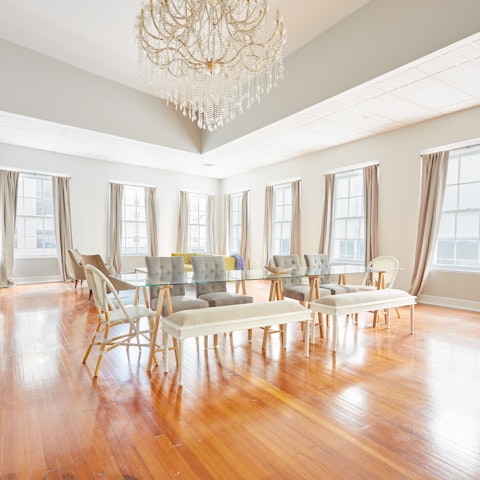 Prepare for a night out in New Orleans at the huge dining table beneath the statement chandelier