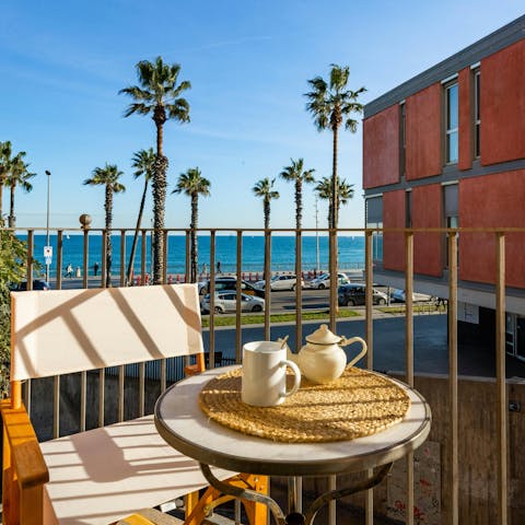 Wake up to swaying palms and sea views