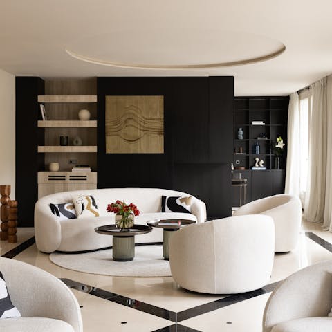 Relax with a glass of Champagne in the elegant living room