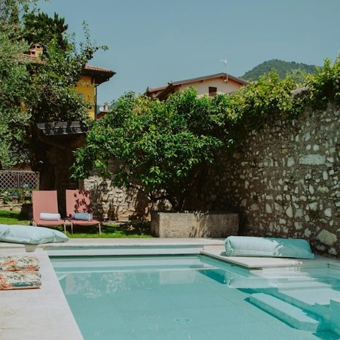 Swim in the private pool as the sunshine warms your skin