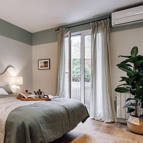 Hop out of bed and open your patio doors to let the fresh morning air in