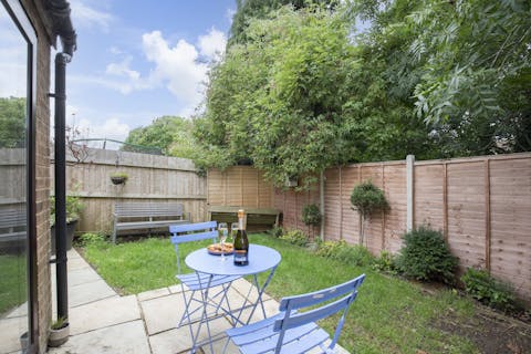 Unwind in the private garden with a glass of Champagne