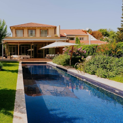 Enjoy peaceful afternoons stretched out by the pool