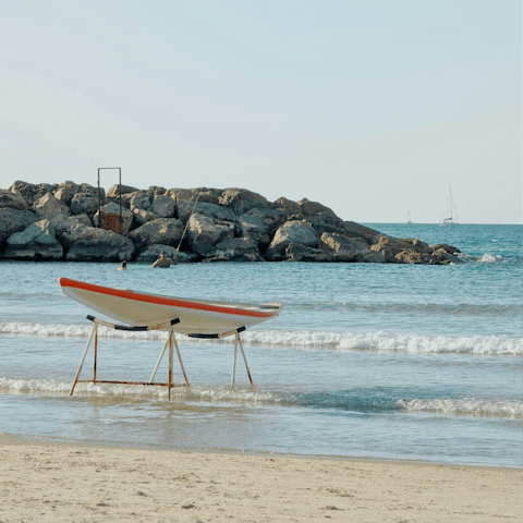 Sink your toes into sand – the beach is just a fifteen-minute stroll away