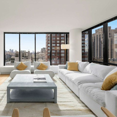 Enjoy city views through floor-to-ceiling windows