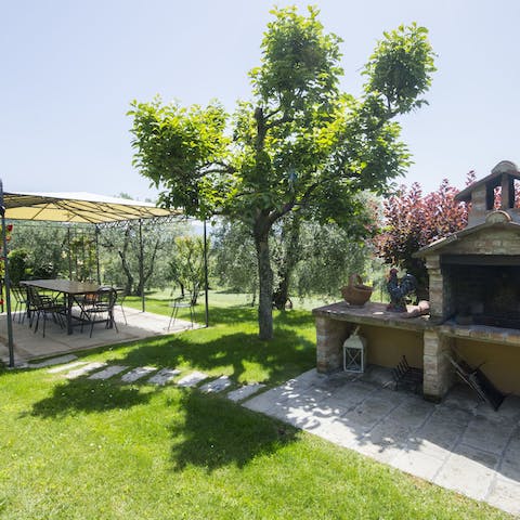 Prepare your food in the stone oven before dining al fresco