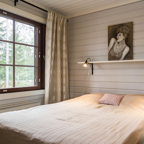 Enjoy views of the surrounding nature from the bedroom window