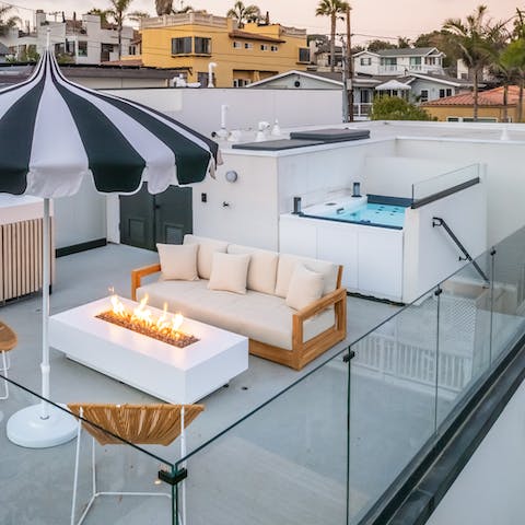 Treat your senses to long soaks in the hot tub and refreshing drinks by the fire