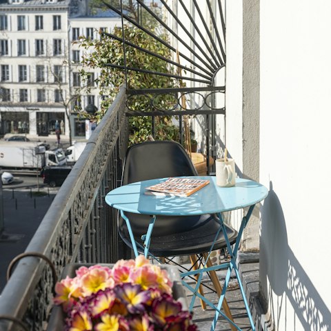 Pad out to the balcony for a drink in the sunshine