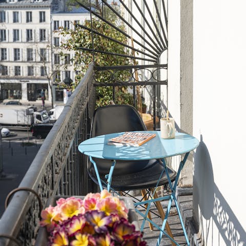 Pad out to the balcony for a drink in the sunshine
