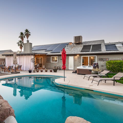 Lounge by the pool under the cloudless desert skies