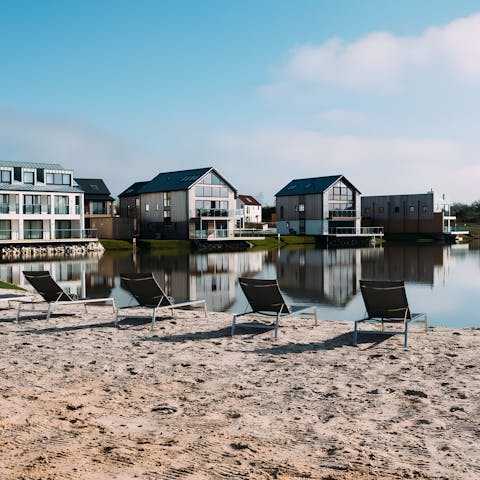 Soak up some rays on the sands of the complex's shared beach
