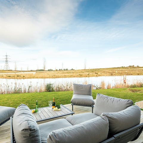 Enjoy tranquil natural scenery from the home's private deck