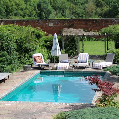 Relax by the pool on a hot afternoon