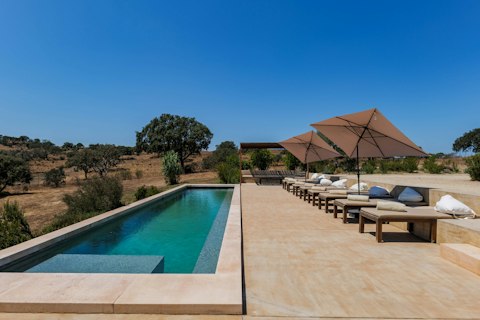 Stretch out beside the pool as the Alentejo landscape opens up