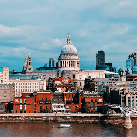 Visit St. Paul's Cathedral and stroll along the Thames, about a twenty-minute walk away
