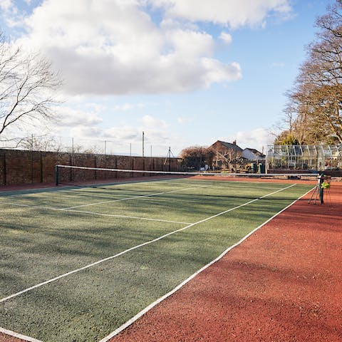 Enjoy a game of tennis for some fun-filled family entertainment