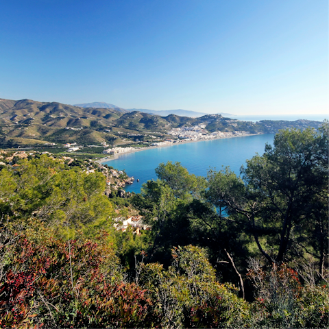 Stretch out on La Herradura Beach, a twenty-minute walk away