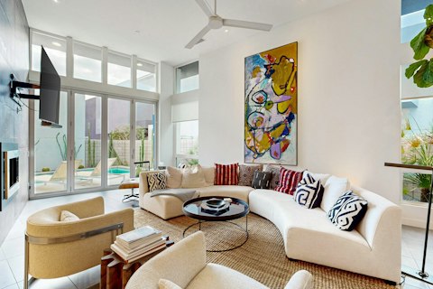 Stretch out in a light-filled living room that opens to the garden
