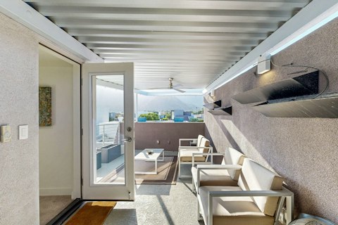 Catch sweeping mountain views from the shaded upper terrace