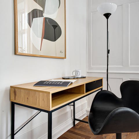 Find a quiet moment to catch up on work at the desk