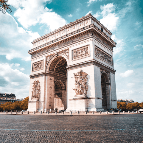 Take in the history of the iconic Arc de Triomphe – you can walk there