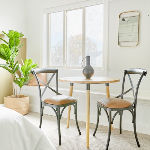 Start the day with a coffee on the bistro-style chairs