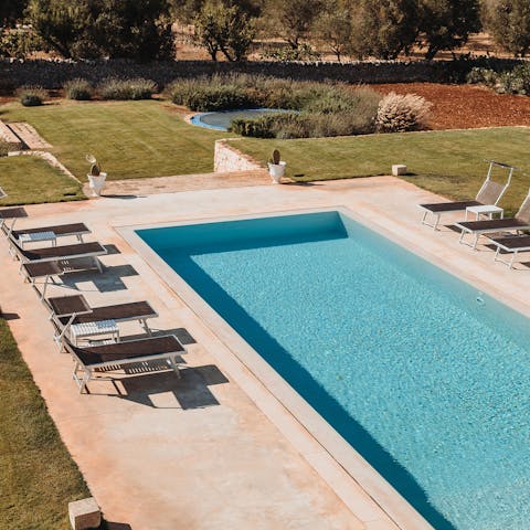 Spend blissful afternoons relaxing by the private pool